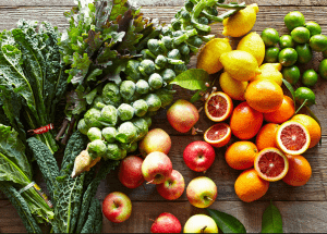 a group of fruits and vegetables on a wood surface Healthy Weight Loss Diets Gerrards Cross